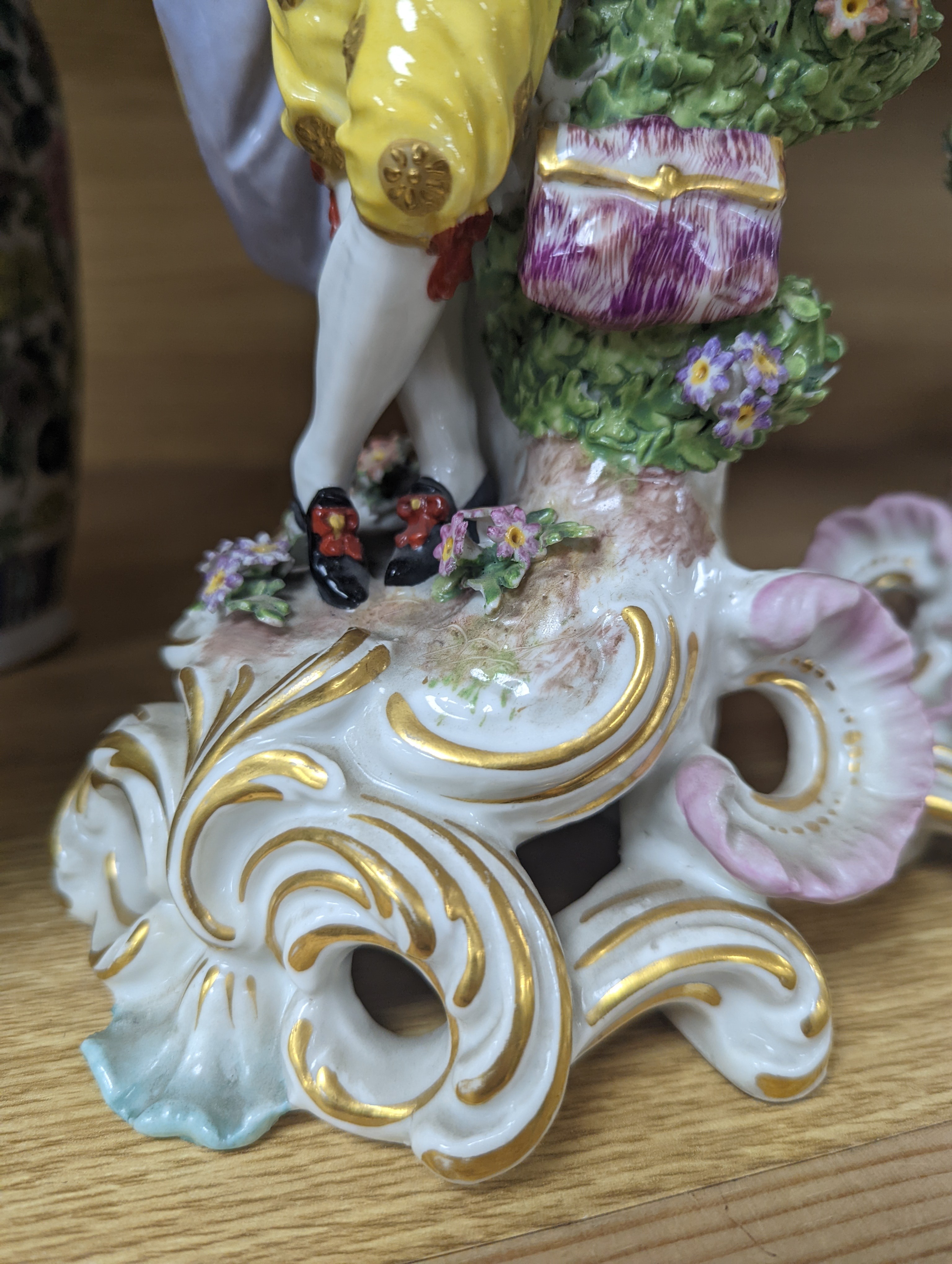 Two Continental porcelain figures, a lady and a gent 27cm